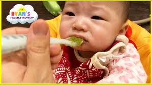 Baby Adrian tries Gerber Graduates Puffs Cereal Snack Banana flavor