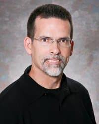 Dr. David E. Milligan, MD