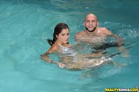 Slutty latina cutie Chichi Medina sucking off a huge dong by the pool -  Pichunter