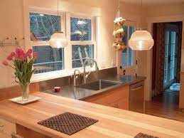 A custom kitchen island is a design that is constructed specifically for the layout of the room. Kitchen Layouts Island Or A Peninsula
