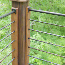 The home's modest proportions call for appropriate deck treatment. Cabin Rustic Deck Railings An Ideabook By Larry Jensen