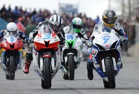 Pure Roads The Start Of The Nw200 Supersport Race Guy Martin Jostles For Position With Michael Dunlop Martin Crosse Motorcycle Culture Supersport Guy Martin