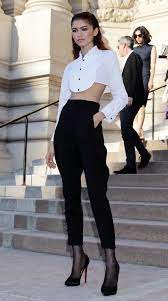 Zendaya Custom Armani Cropped Tuxedo Shirt With Riding Pants Tights And Heels Paris Fashion Week Laine Tuxedo Women Zendaya Outfits Women Tuxedo Outfit