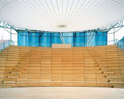 luna by alice studio hovers over an outdoor theater outdoor theater outdoor architecture design