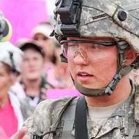 U.S. Air Force Maj. Triven Pillai stands with the finance