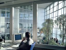 Visitors take in the city skyline view from the 15th floor pantry area inside the european central bank (ecb) headquarters as skyscrapers tower over commercial and residential property in. Commerzbank Headquarters Foster Partners Foster Partners Green Terrace Architecture