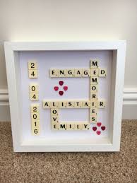 While wedding gifts are easy to figure out thanks to their registry, the engagement phase can be harder. Engagement Present Scrabble Art Diy Engagement Gifts Personalized Engagement Gifts Engagement Presents