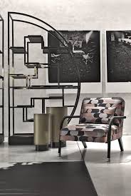 Middle notes are honeysuckle, carnation, mandarin orange, orchid, orris root, orange blossom, rose and narcissus; Gianfranco Ferre Home