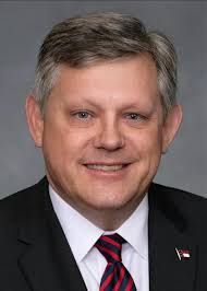 On the front lines': Mayoral candidate Mike Woodard hopes to improve Durham  city services, maintain strong economy