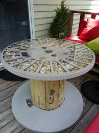 Table Made From Wooden Spool I Spray Painted With A Stone Finish And Accentuated With Gravel Wooden Spool Tables Wood Spool Tables Spool Furniture