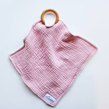 Get the right baby pacifier for your little one. Organic Baby Teether Organic Muslin And Sherpa Teething Etsy Organic Blankets Teethers Baby Teethers
