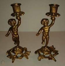 Maybe you would like to learn more about one of these? Vintage Brass Cherub Candle Holders 1732762504