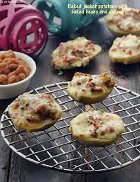 Baked Jacket Potatoes With Baked Beans And Cheese Recipe Baked Potato Recipe Recipes Paratha Recipes Potatoes