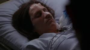 Scully: "It's true, John. She's gone." John Doggett: "I don't accept that.  Look at her breathing. Her heart's still beating. There's got to be hope."  Scully: "There's no measurable electrical activity in