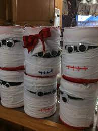 Pin By Anita Dally On Coffee Cans Pinterest Halloween Bottles Monster Crafts Coffee Can Crafts