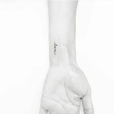 Love Tattoo On Wrist Tattoo Idea One Word Tattoos Tattoos Word Tattoos
