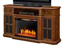 Our sleek styles of fireplace tv stands would look amazing in your living room, doubling as a media center for entertaining. Sinclair Tv Stand In Aged Cherry 25 Firebox 259 18 48 Muskoka Electric Fireplace Tv Stand Fireplace Tv Stand Fireplace Tv