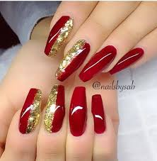 25 Flattering Red And Gold Nail Designs For 2021 Stiletto nails let your nails do all the talking with these festive red press on nails decorated with gold fine glitters and hexagonal glitters.