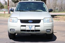 Image result for Gold Ash 2004 Escape