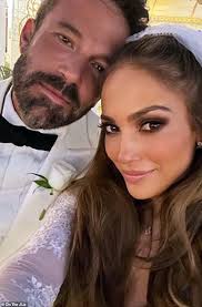 Jennifer Lopez and husband Ben Affleck check in