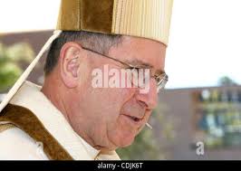 Cardinal Roger Mahony, Archbishop of Los Angeles, exits the funeral of  California Highway Patrol (CHP) Officer Philip Ortiz at the Cathedral of  Our Lady of the Angels