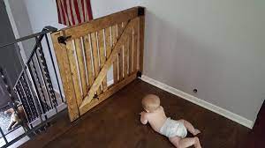 Diy Barn Door Baby Gate With Pet Door Instructions Diy Baby Gate Cat Door Diy Barn Door Baby Gate