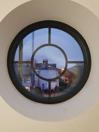 A round window placed in an unexpected area can make a wonderful focal point for a room. Bespoke Windows Doors Quality Round Window Installation In Lewisham