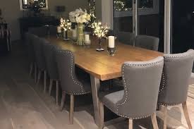 Very cozy, traditional dining room with wooden ceiling, wooden table and matching chairs. Abacus Tables Project 613