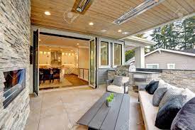 Umbrella covers, patio waterproof market parasol covers with zipper. Luxury Modern House Exterior With Covered Patio Boasting Stone Fireplace And Cozy Furniture Lizenzfreie Fotos Bilder Und Stock Fotografie Image 118547123