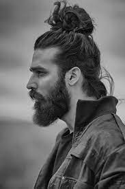 How To Get Style And Sport The On Trend Man Bun Hairstyle Man Bun Hairstyles Long Curly Hair Men Long Hair Styles