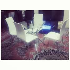 For Sale White Dining Table Glass Modern Style For 4 Person Price 55 Bd للبيع طاولة طعام لون ابيض مودرن ستايل ل 4 اربعة اشخا Home Decor Decor Ghost Chair