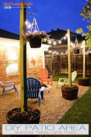Diy Patio Area With Texas Lamp Posts Backyard Area Backyard Diy Patio