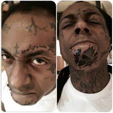 Lil Wayne debuts new face tattoos