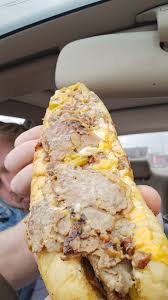 We made it out to AJ's Cheesesteaks in madisonville And I got to try the  philly chese steak with bacon Now Ive had their cheesesteak many moons ago  at a food truck