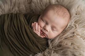 Who is a good newborn photographer?