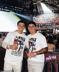 Travis Kelce's new teammate Louis Rees-Zammit gets into the Chiefs spirit  as he's spotted watching Taylor Swift's Eras Tour concert in Cardiff