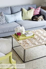 Whether you choose to frame a large mirror or to shape a succulent planter holder, the eccentric white driftwood is an option worth taking into account. Diy Herringbone Driftwood Coffee Table The Inspired Room