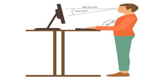 Proper sitting posture at computer desk is recommended for good blood circulation, relief of back pain. How To Stand At A Standing Desk