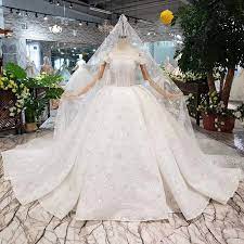 Her styles which are elegant without being fussy are chosen by. Htl306 Puff Cap Sleeves Ball Gown Sexy Elegant Sequin Plus Wedding Dress With Long Veil Buy Long Trail Wedding Dress Bridal Gown Ball Dress Gown Top 10 Wedding Dress Designers Wedding Bridal
