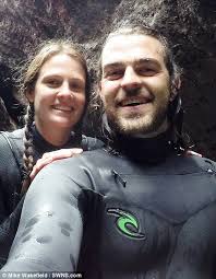 Plumber proposes to his girlfriend using 30ft sand art creation