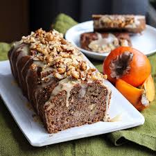 Chai Spiced Persimmon Tea Loaf With Citrusy Tahini Frosting And Candied Pecans Vegan By Maikin Mokomin Chai Cake Cake Food