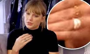 Spilling the deets about her upcoming here's a look at taylor swift's 'red' ring as fans believe it hints at olivia rodrigo collab. Taylor Swift Sparks Engagement Speculation After She S Seen Rocking Huge Ring In Her New Documentary Daily Mail Online