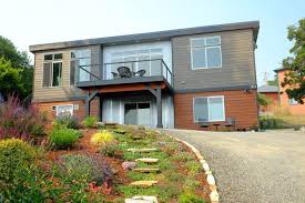 Ideabox Over A Daylight Basement Yes We Can Do That Ideabox Prefab Manufacturedhome Pnw Modularhome Metal Buildings Modern Prefab Homes Pole House