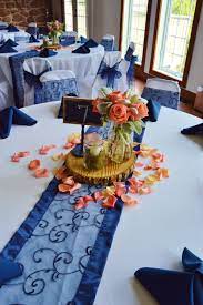 Wood With Glass Coral Roses And Lambs Ear Centerpiece With Navy Blue Table Run Coral Wedding Decorations Navy Blue Wedding Decorations Blue Wedding Decorations