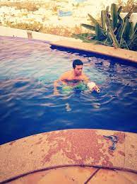 Ram charan latest breaking news, pictures, photos and video news. Ram Charan And His Dog Brat In Swimming Pool Ram Charan Fun Time With His Dog Brat