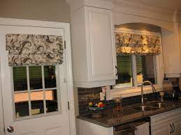 This not only allows for a good amount of light to the kitchen, but it also gives access to viewing outdoors while standing at the sink. Kitchen Window Treatments Houzz