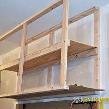 Cabinets are great for storing things and keeping the garage neat and tidy. Diy Garage Storage Ceiling Mounted Shelves Giveaway
