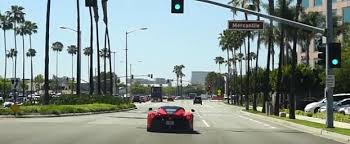 Ferrari race car racing around track at raceway. First Modified Laferrari Has Custom Exhaust And Tune For Fxx K Sound Autoevolution