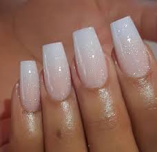Ombré nails always look great but many people don't bother because they think it's a difficult style to achieve. Pink And White Ombre Acrylic Nails With Glitter Novocom Top