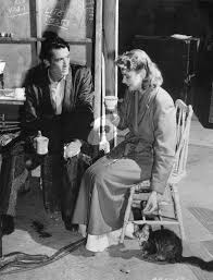 Ingrid and Gregory Peck on the set of ...